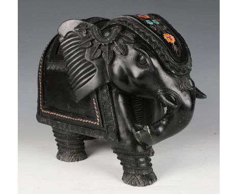 A large late 20th century Indian black stained carved soapstone model of an elephant, finely inlaid in various hardstones, le