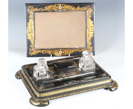 A mid-Victorian papier-mâché inkstand with gilt and mother-of-pearl inlaid decoration, width 35.5cm, together with a similar 