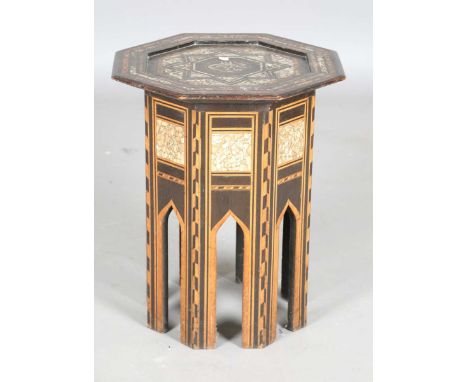 A late 19th century Middle Eastern octagonal occasional table, similar to those retailed by Liberty &amp; Co, profusely inlai