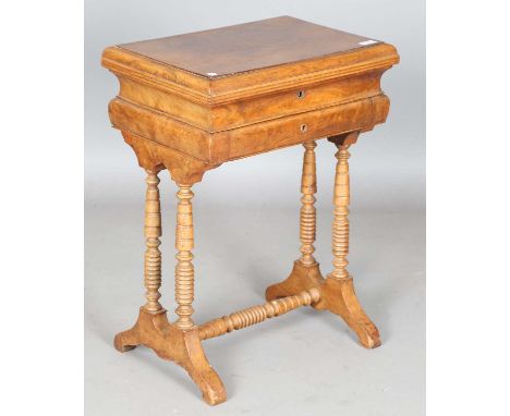 A 19th century Continental burr walnut work table, on bobbin turned legs, height 70cm, width 52cm, depth 36cm.