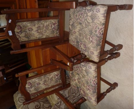 Pair of ercol armchairs with upholstered seats and back