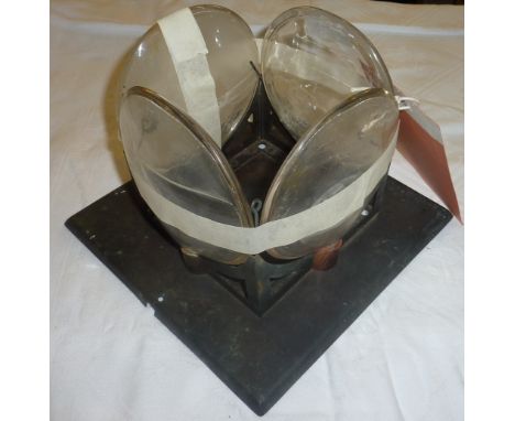 Edwardian light fitting with glass vessels that hold coloured water