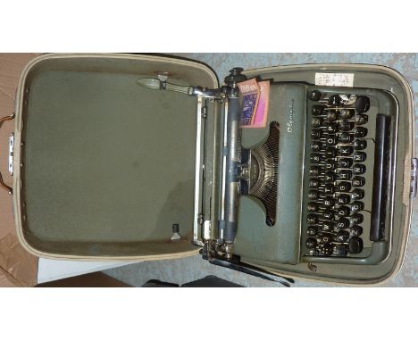 Cased Olympia typewriter