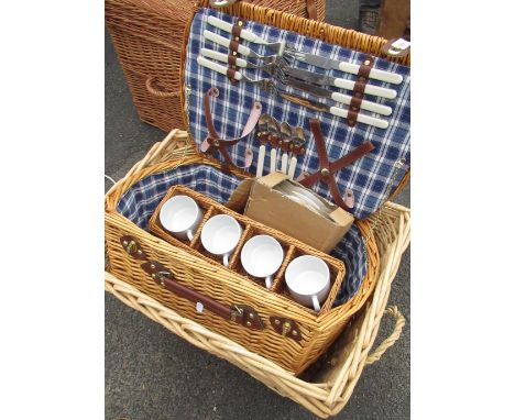 Wicker picnic basket with various cups cutlery etc and a rectangular wicker laundry basket (2) 