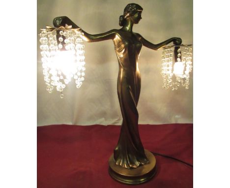 C20th Art Deco style bronzed table lamp in the form of a female figure in a long dress with outstretched arms H62cm 