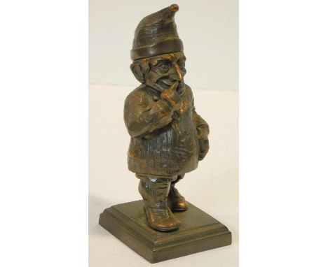 A vintage copper table lighter in the form of Mr Punch, hat is hinged and opens to show lighter. Mounted on a square base, RE