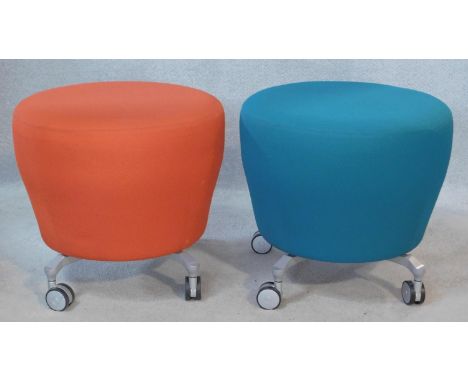 A pair of vintage Orangebox stools in apricot and azure upholstery on metal supports. H.50cm 