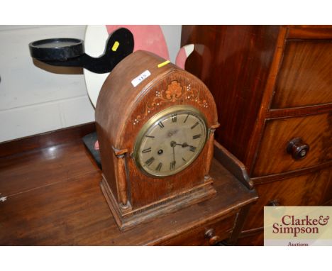A John Elkan inlaid oak mantel clock