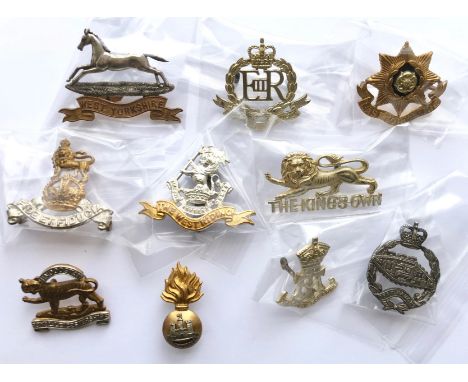 10 assorted Officer cap badges.East Yorkshire ... Royal Military Police (EIIR) ... Royal Army Pay Corps ... Royal Rank Regime