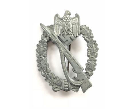 German Third Reich WW2 Army / Waffen-SS Infantry Assault breast badge by Metal und Kunststoff, Gablonz.A good die-cast exampl