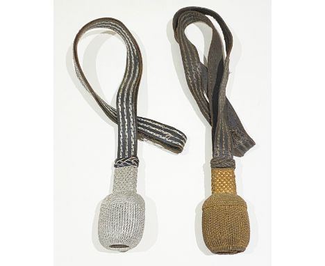 Two German Sword Knots, Portapees.The first example of gold bullion knot with gold lines to the leather strap. (Age wear) ...