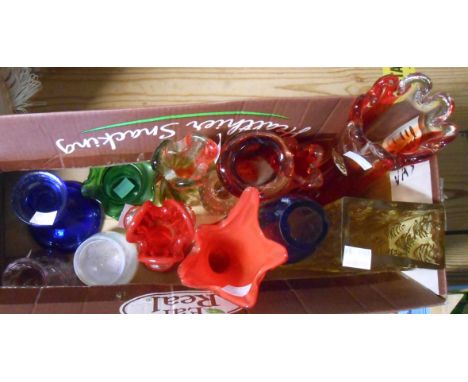 A box containing a selection of vintage art glass and other vases