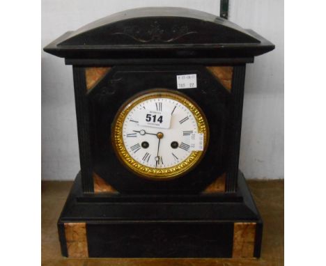 A late Victorian black slate and marble cased mantel clock with decorative gilt bezel and French eight day bell striking move