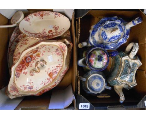 A box containing two Victorian pottery teapots, a Copeland Spode Camilla soup cruet and a Japanese porcelain hot water jug - 