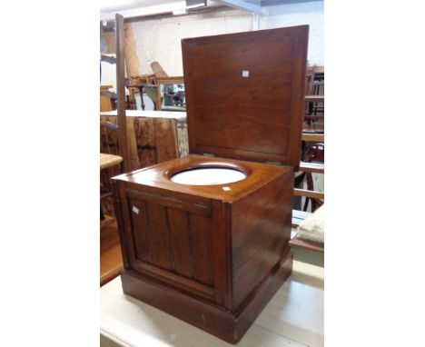 A Victorian mahogany box commode with lidded china liner