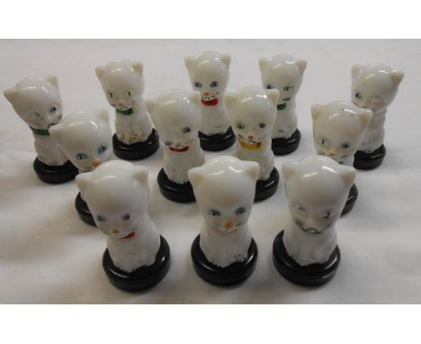 Twelve vintage novelty glass cat form scent bottles
