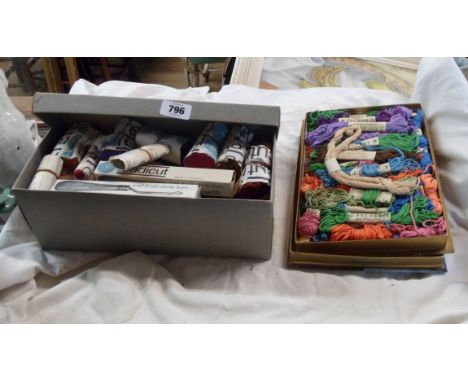 A box containing a selection of rug wool and rug making tools - sold with a small box of Anchor embroidery thread