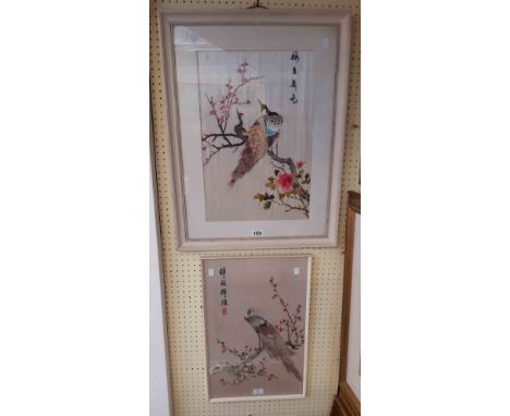 Two framed vintage Chinese silk embroidery pictures, both depicting perching peacocks
