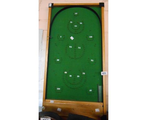 A vintage table bagatelle game