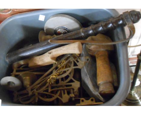 A plastic bowl containing assorted metal and other collectable items including piano candlesticks, wooden tools, truncheon, e