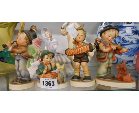 Four vintage Hummel figurines