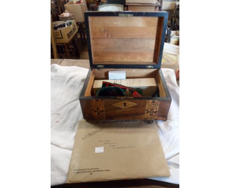 A 19th Century Tunbridge ware work box containing assorted regalia related to the WWII Womens Land Army Service of Mrs. K. So