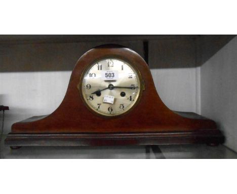 A 20th Century walnut cased Napoleon hat mantel clock with eight day gong striking movement