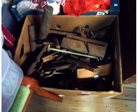A box of old woodworking tools including 19th Century Hathersich moulding planes, etc.