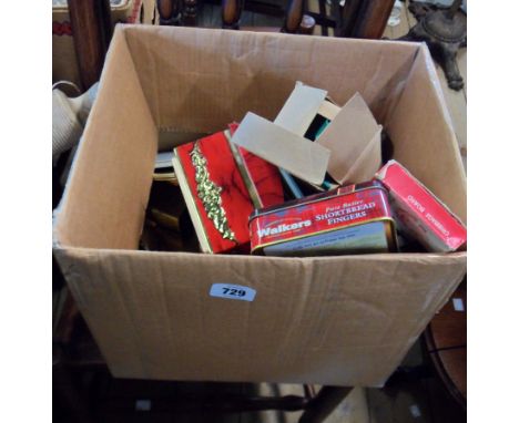 A box containing assorted collectable items including advertising tins, cribbage board, slide rule, etc.
