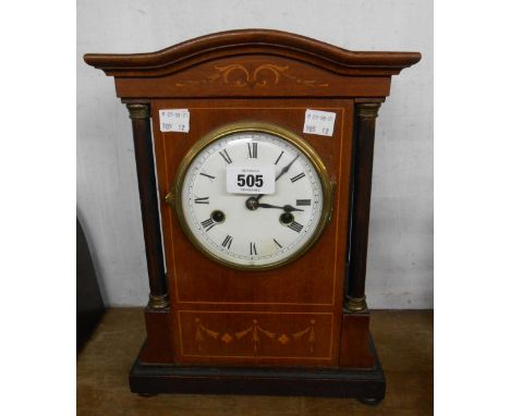 A late 19th Century German inlaid mahogany cased mantel clock with flanking slender columns and HAC eight day gong striking m