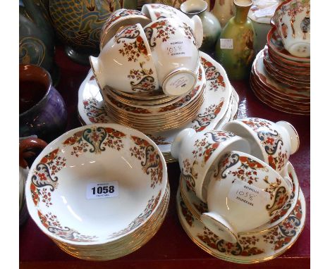 A vintage Colclough bone china part tea set comprising seven trios, five bread and butter plates and nine cereal bowls