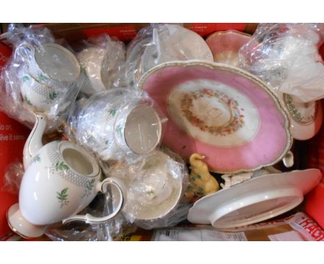 A box containing assorted ceramic items including Goebel figurine, vases, plates, part tea set, etc.