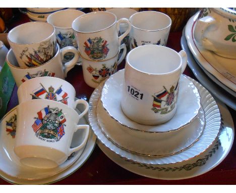 A selection of ceramic items made to commemorate the end of WWI in 1918 including mugs, plates, etc.