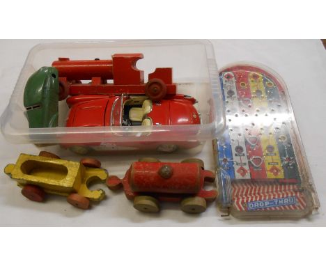 A small quantity of collectable toys comprising wind-up tin plate car, Burago Chevrolet model, tin plate drop through bagatel