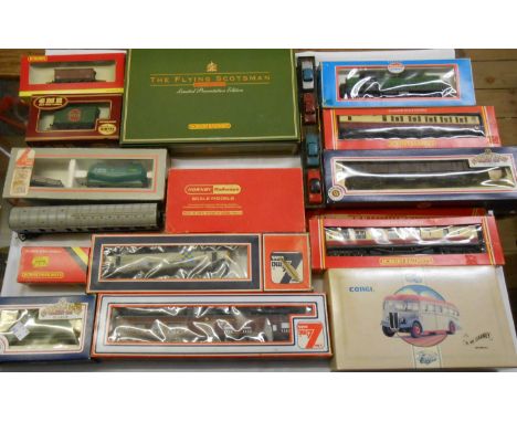 A crate containing a selection of model railway items including Lima Diesel loco and carriages, Hornby Flying Scots limited p