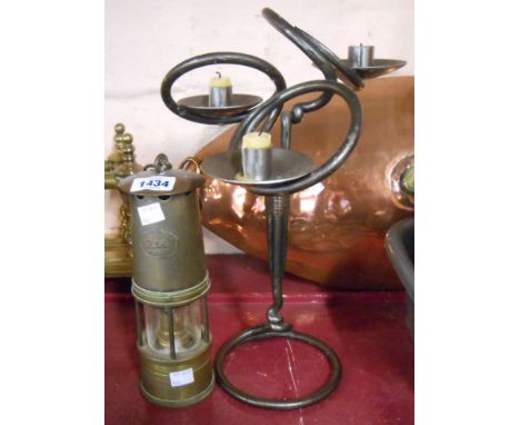 A vintage Prima brass miner's lamp - sold with a modern wrought iron three branch candelabra