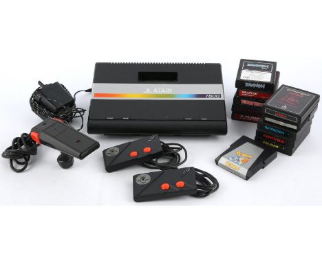 Atari 7800 loose bundle (PAL) Includes: 7800 console, 2600 pro joystick, CX-78 controller (x2), official power supply and 11 