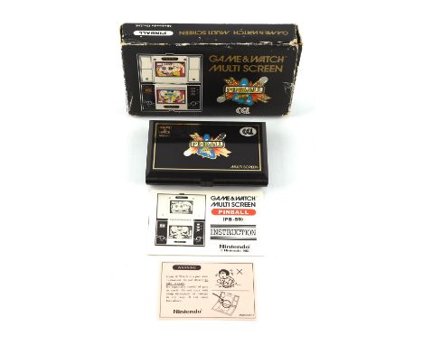 Nintendo Game & Watch Pinball [PB-59] handheld console from 1983 Item is complete and boxed with original manual, poly tray a