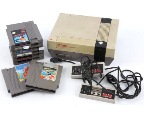 Nintendo Entertainment System (NES) loose console/cartridge bundle (PAL) Includes: Loose console (NES Version), 2 official co