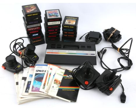 Atari CX-2600 Junior Console with accessories and loose games (PAL) Games include: Centipede (x2), Dodge 'Em, Adventure, Smur