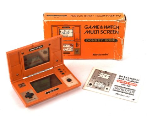 Nintendo Game & Watch Donkey Kong [DK-52] handheld console from 1982 (complete and boxed) Condition Report:  There is conside