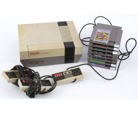 Nintendo Entertainment System (NES) loose console/cartridge bundle (PAL) Includes: Loose console (NES Version), 3 official co