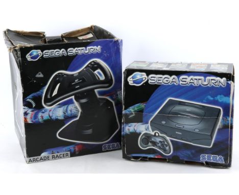 SEGA Saturn boxed bundle (PAL) Includes: Console (boxed) and Arcade Racer peripheral (boxed) Items are complete, boxed and in