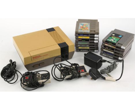 Nintendo Entertainment System (NES) loose console/cartridge bundle (PAL) Includes: Loose console (NES Version), 2 official co