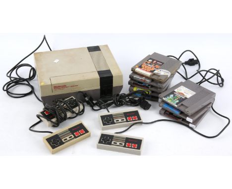 Nintendo Entertainment System (NES) loose console/cartridge bundle (PAL) Includes: Loose console (NES Version), 4 official co