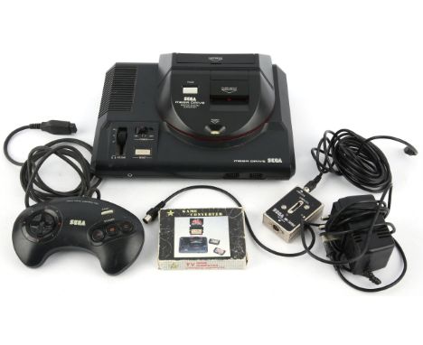 SEGA Cartridge Converter bundle (PAL) Includes: SEGA Mega Drive console, Mega Drive-to-Master System Converter, Mega Drive Co
