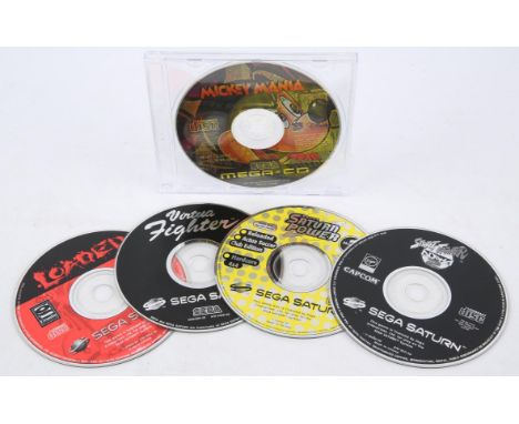 An assortment of game discs across various SEGA consoles (PAL) [5] Includes: Mickey Mania demo CD, Street Fighter Alpha 2, Lo