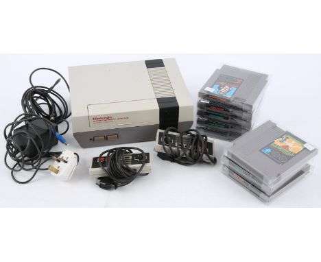 Nintendo Entertainment System (NES) Mattel bundle (PAL) Includes: NES Console [Mattel Version], 2 Control Pads, RF Lead and 8