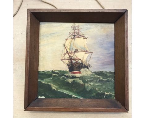 Vintage 1947 Painted Tile painted with a scene of an old sailing ship on the sea. Framed and with an inscription on the back 