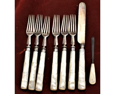 Silver and Pearl handled cutlery (8) pieces in good condition, five forks, one pair of tweezers and a knife. 